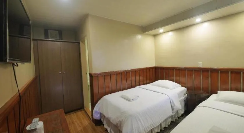 Bed in Mountain Lodge Hotel and Restaurant