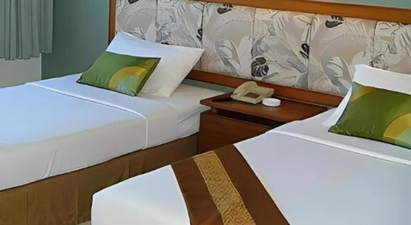 Bed in The Park Hotel Pattaya