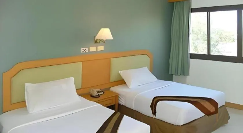 Bed in The Park Hotel Pattaya