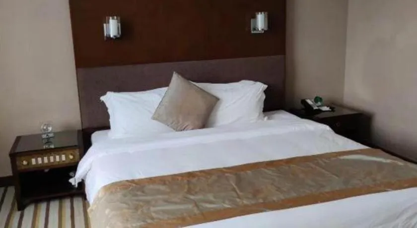 Bed in Poly Hotel