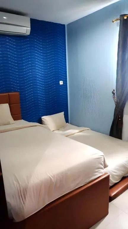 Bed in The Aroma's of Bali Hotel & Residence