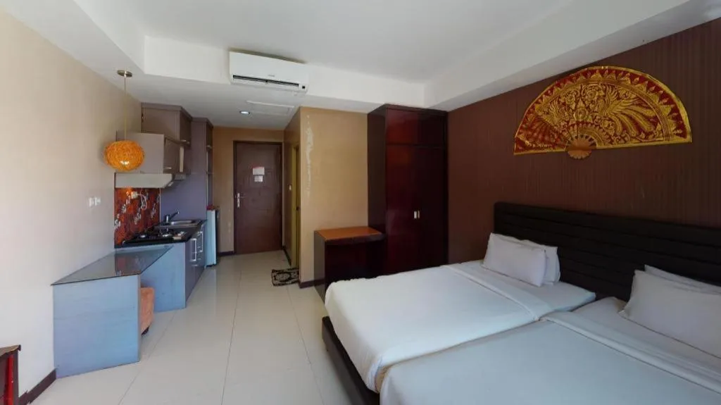 Bed in The Aroma's of Bali Hotel & Residence