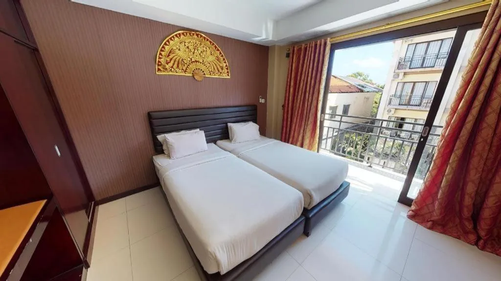 Bed in The Aroma's of Bali Hotel & Residence