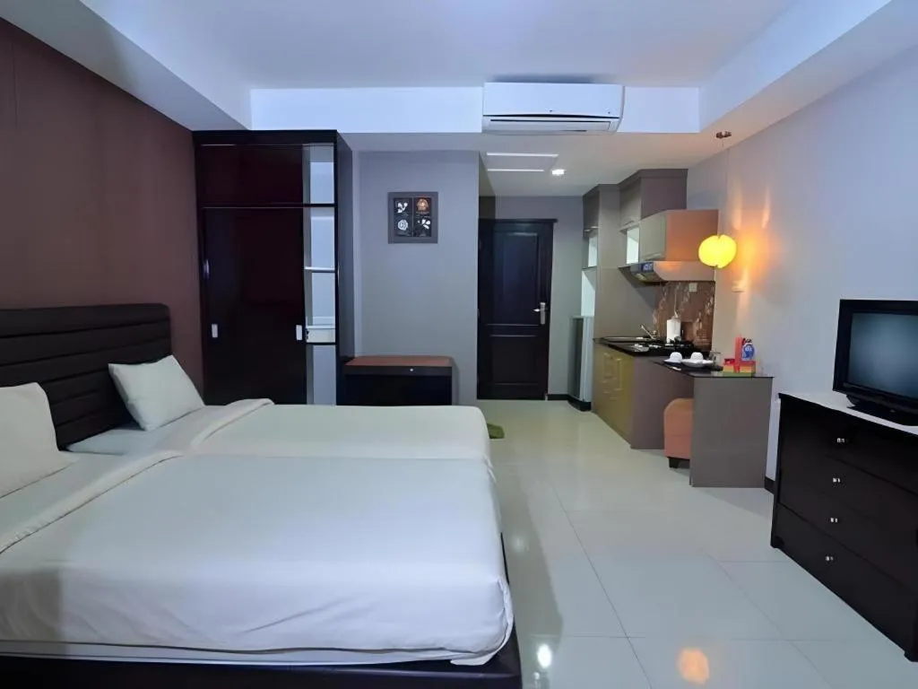 Bed in The Aroma's of Bali Hotel & Residence