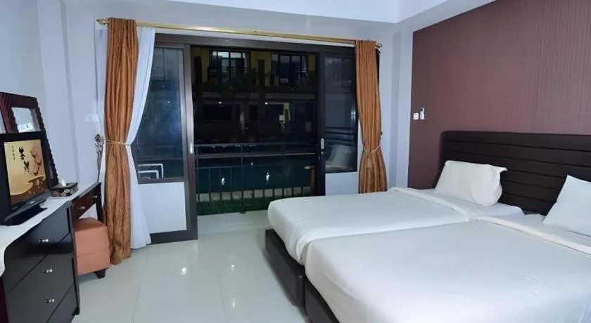 Bed in The Aroma's of Bali Hotel & Residence