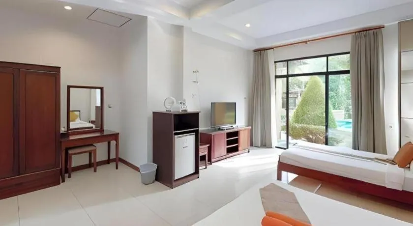 Bed in Nattha Waree Hot Spring Resort and Spa