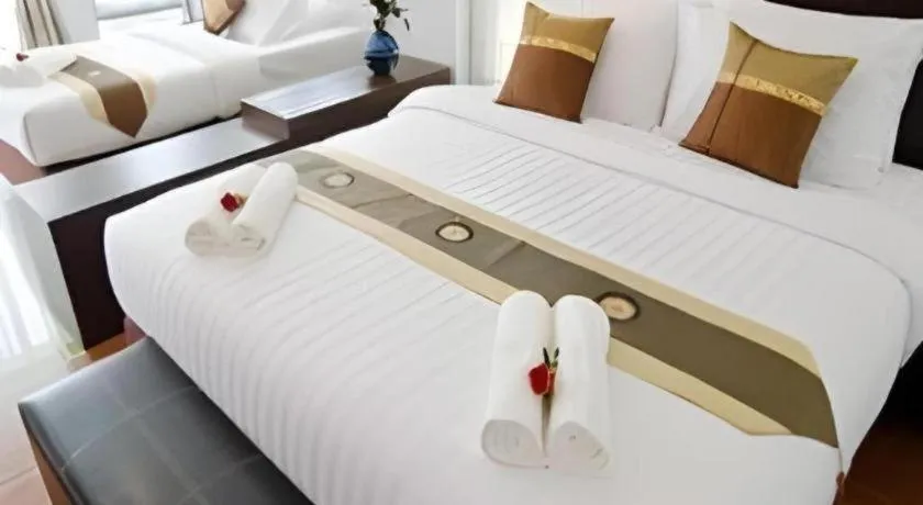 Bed in Nattha Waree Hot Spring Resort and Spa