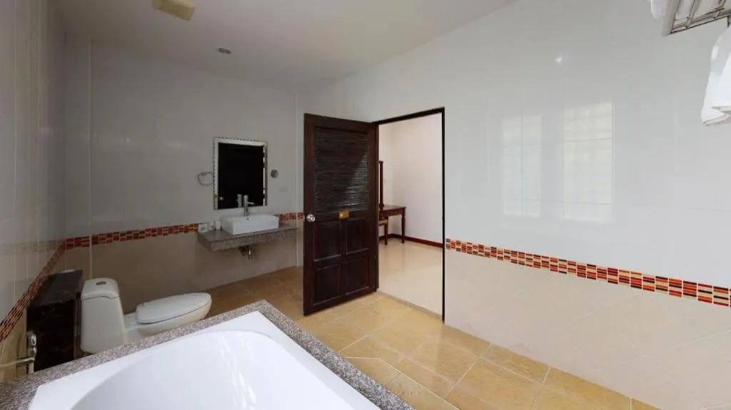 Bed in Nattha Waree Hot Spring Resort and Spa