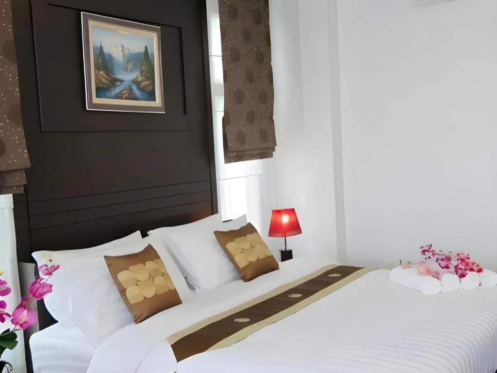 Bed in Nattha Waree Hot Spring Resort and Spa