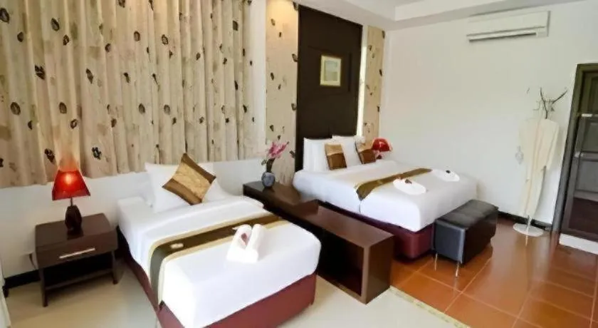 Bed in Nattha Waree Hot Spring Resort and Spa