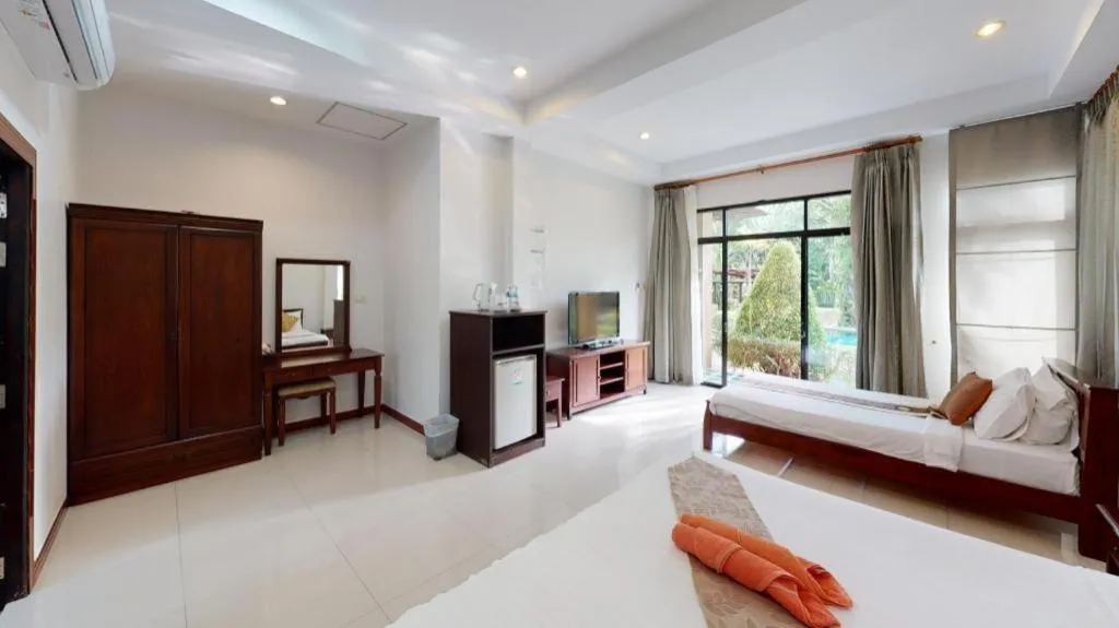 Bed in Nattha Waree Hot Spring Resort and Spa