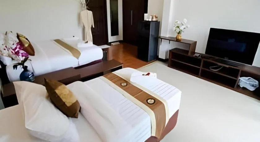 Bed in Nattha Waree Hot Spring Resort and Spa