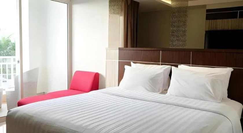 Bed in CLARO Makassar Hotel & Convention