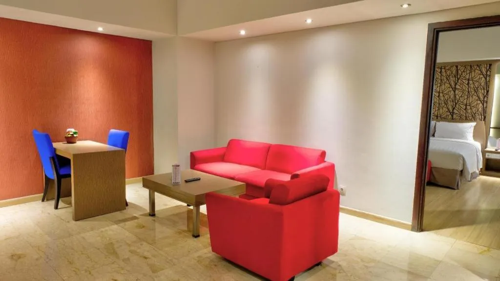 Bed in CLARO Makassar Hotel & Convention