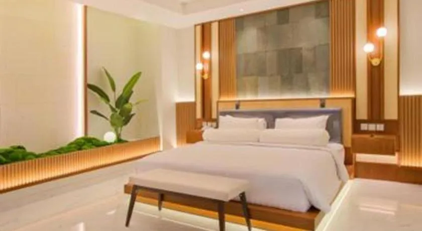 Bed in CLARO Makassar Hotel & Convention