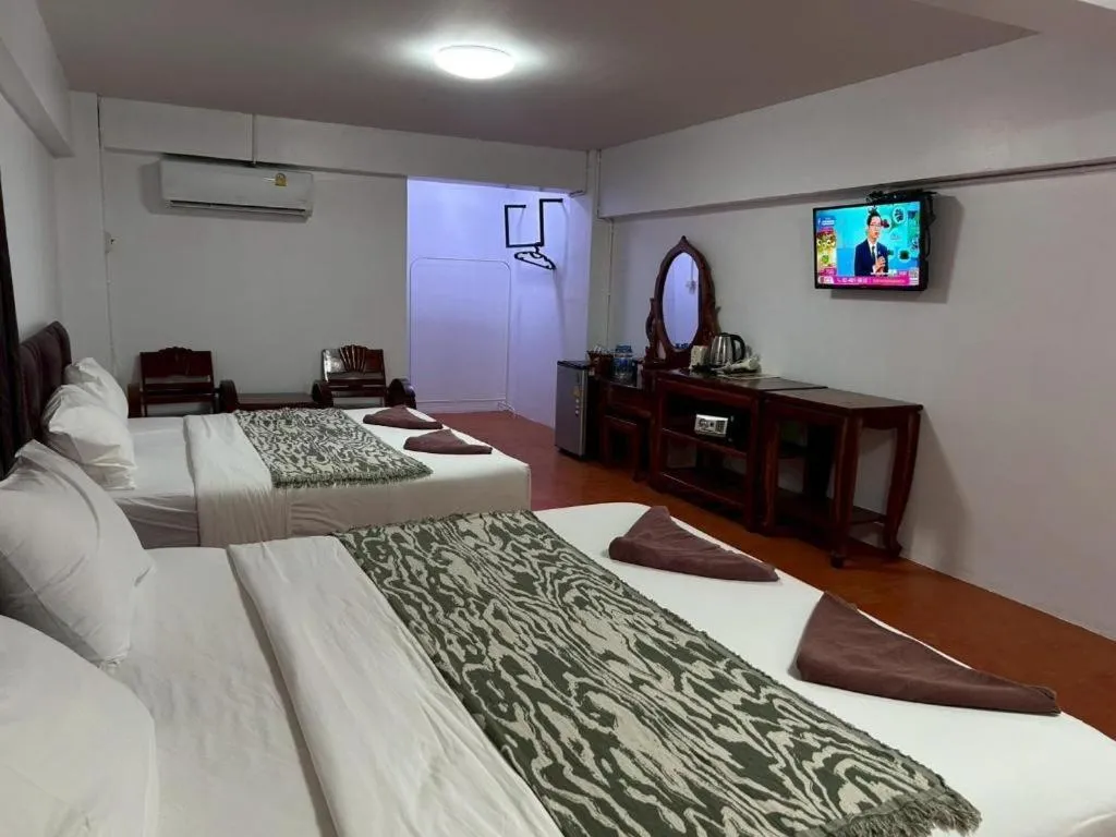 Bed in Jirawan Hotel