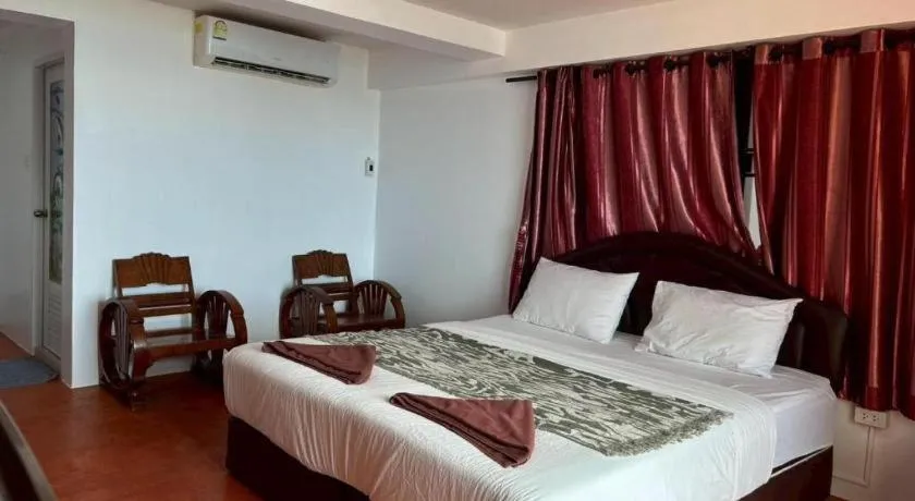 Bed in Jirawan Hotel