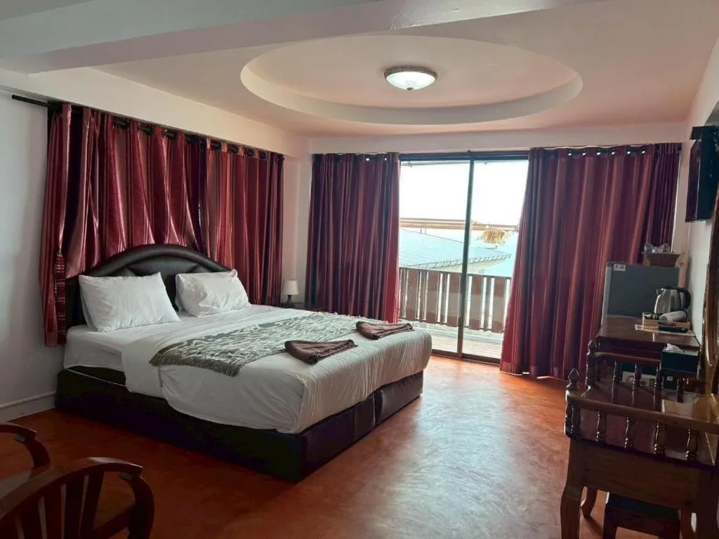 Bed in Jirawan Hotel