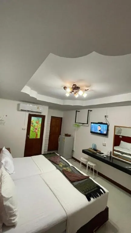 Bed in Jirawan Hotel