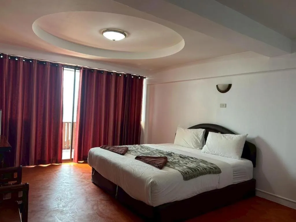 Bed in Jirawan Hotel