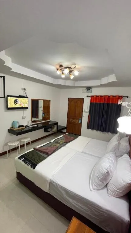 Bed in Jirawan Hotel