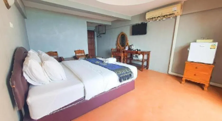 Bed in Jirawan Hotel