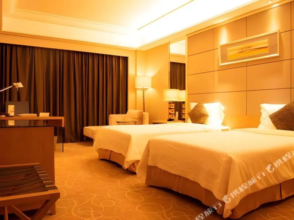 Bed in Wellton International Hotel