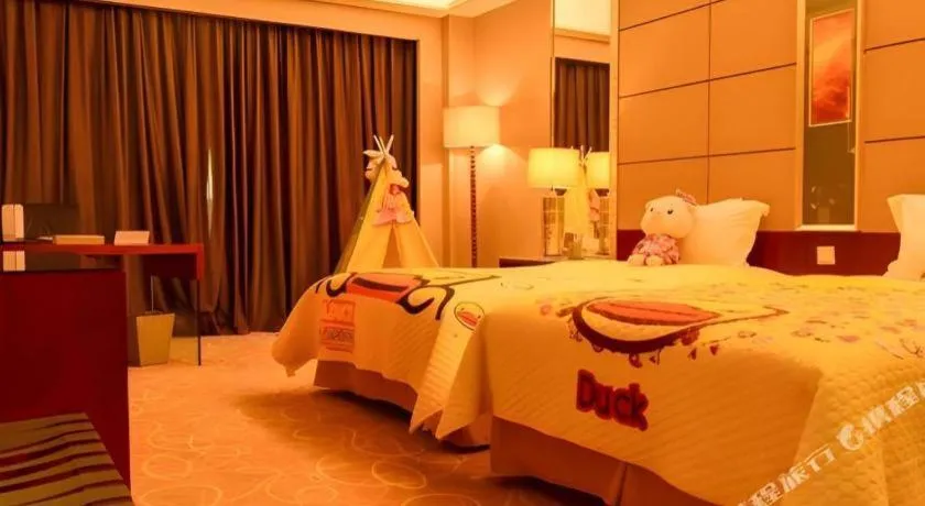 Bed in Wellton International Hotel