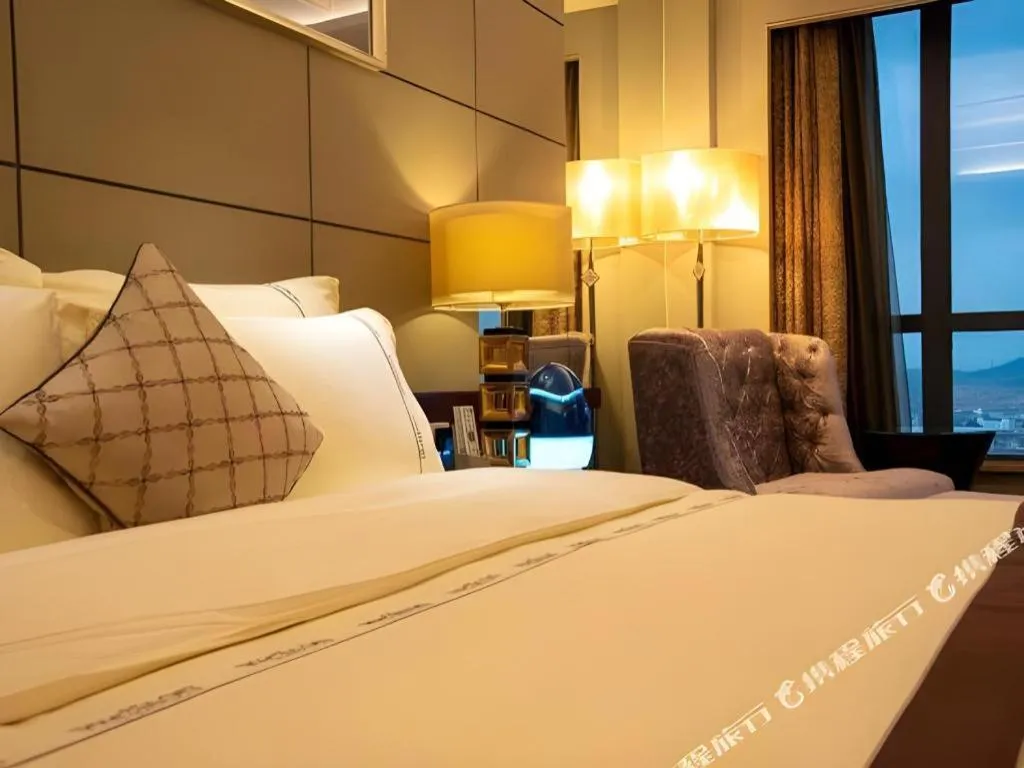 Bed in Wellton International Hotel