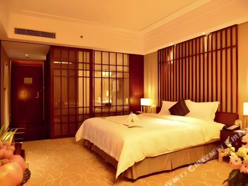 Bed in Wellton International Hotel