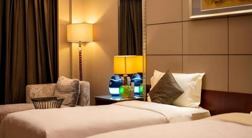 Bed in Wellton International Hotel