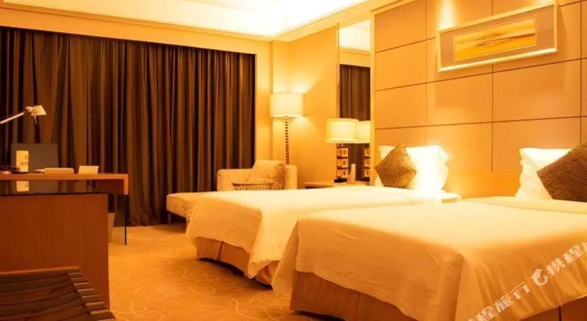 Bed in Wellton International Hotel