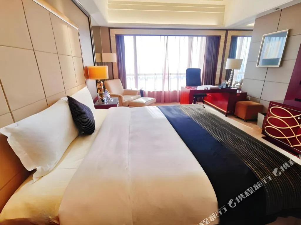 Bed in Wellton International Hotel