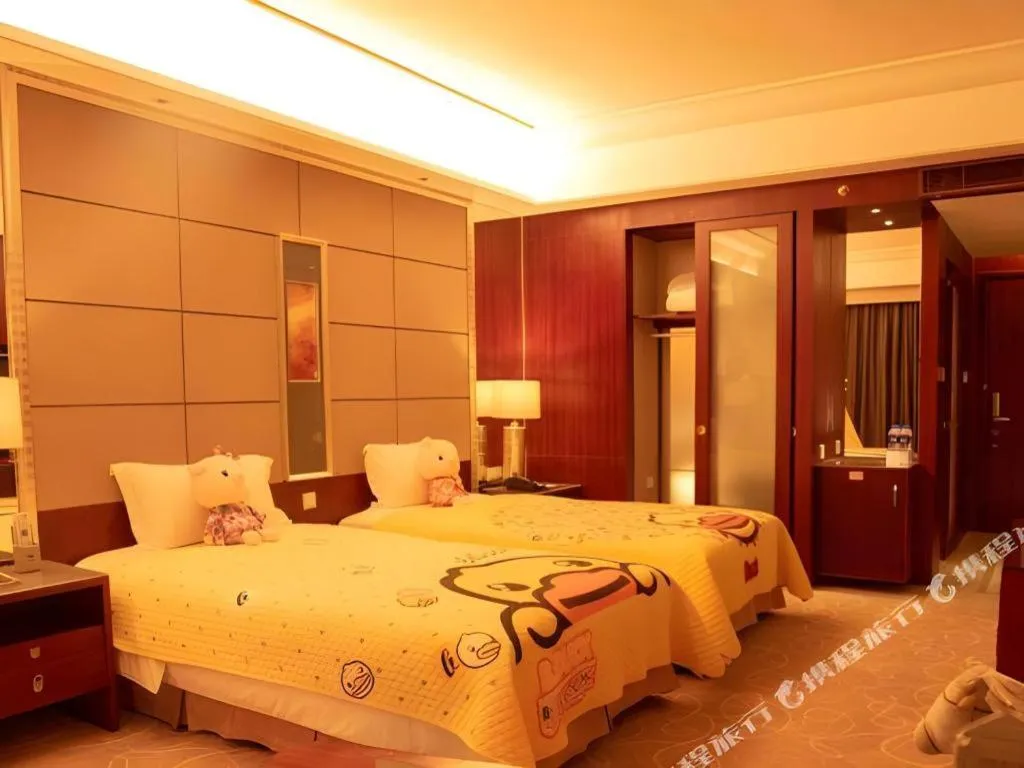 Bed in Wellton International Hotel