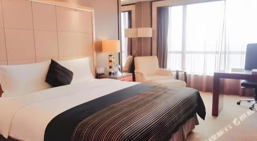 Bed in Wellton International Hotel