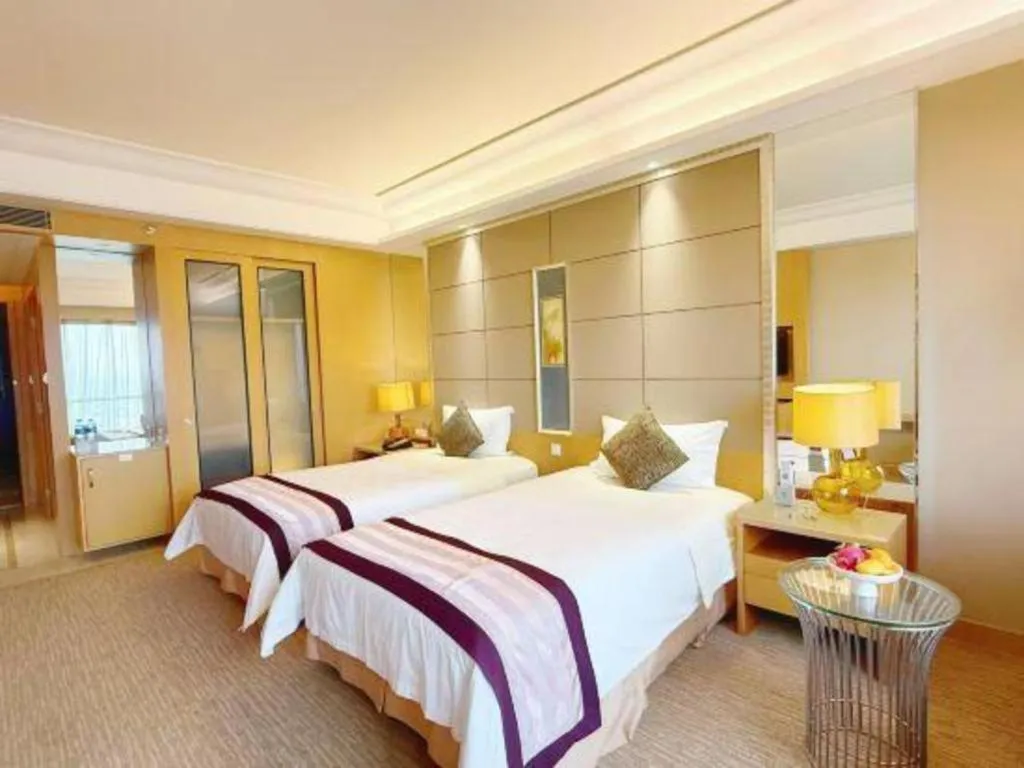 Bed in Wellton International Hotel