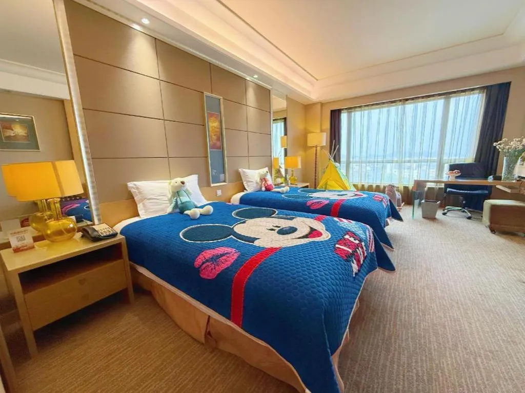 Bed in Wellton International Hotel