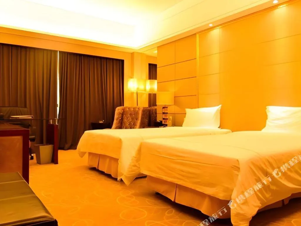 Bed in Wellton International Hotel