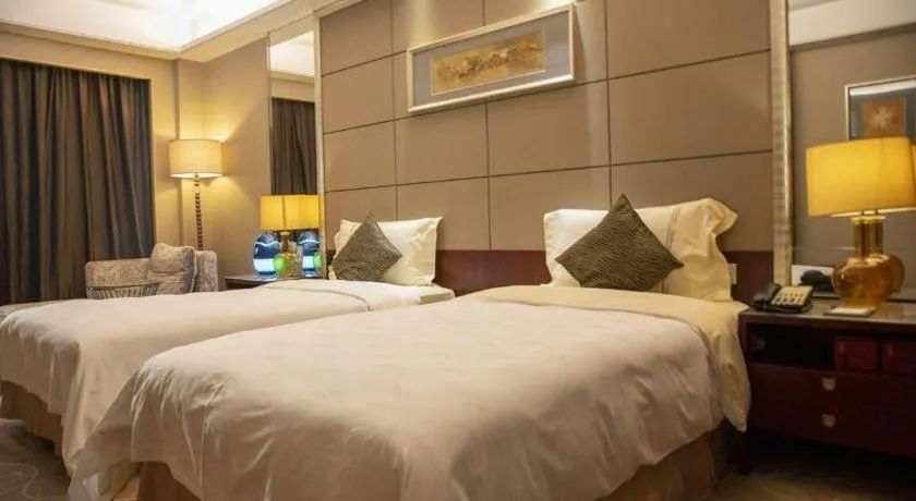 Bed in Wellton International Hotel