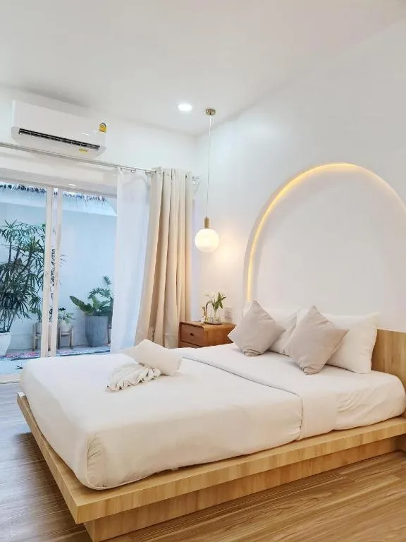 Bed in Sawasdee Coco Resort