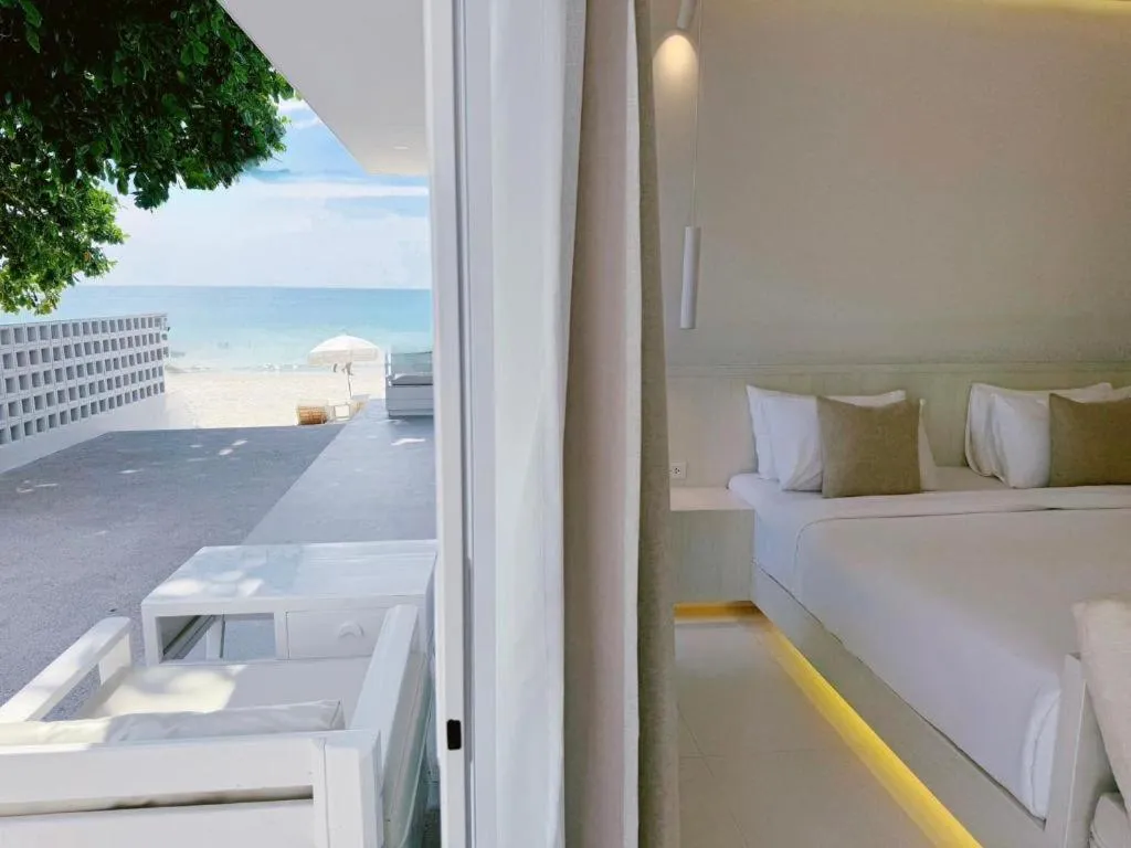 Bed in Sawasdee Coco Resort