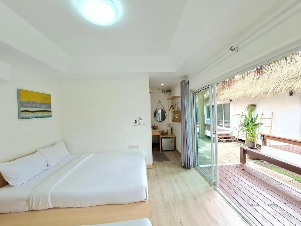 Bed in Sawasdee Coco Resort