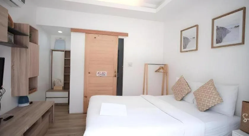 Bed in Sawasdee Coco Resort