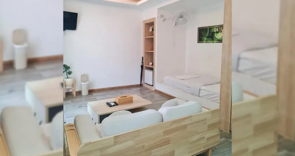 Bed in Sawasdee Coco Resort