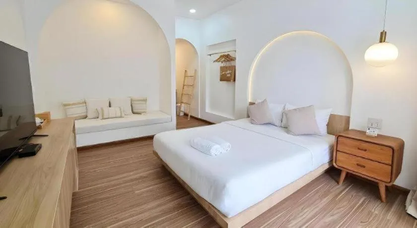 Bed in Sawasdee Coco Resort