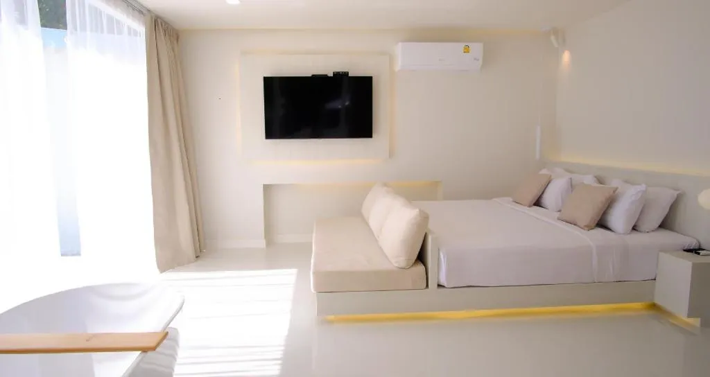 Bed in Sawasdee Coco Resort