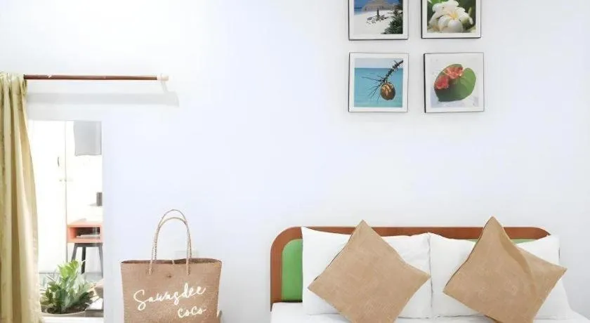 Bed in Sawasdee Coco Resort