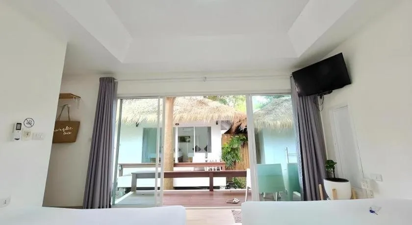 Bed in Sawasdee Coco Resort