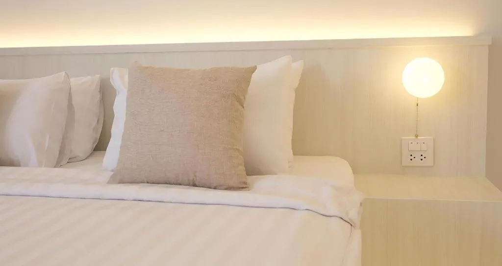 Bed in Sawasdee Coco Resort