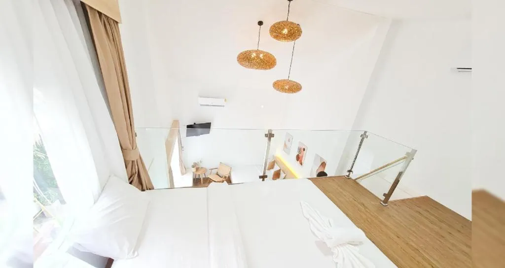 Bed in Sawasdee Coco Resort